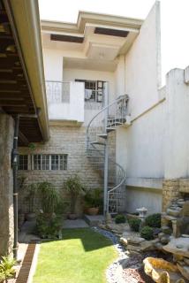 Spiral staircase to maids room