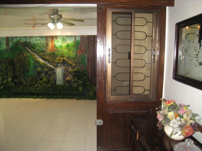 living room with lanai entrance