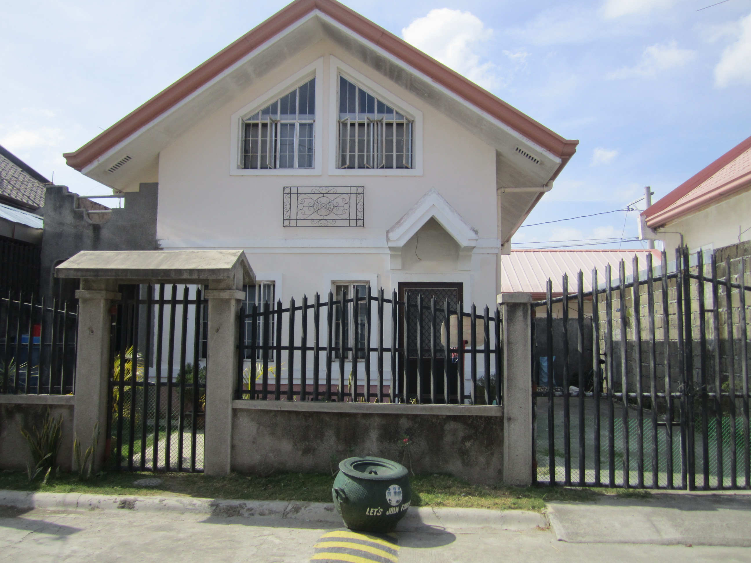 front view concrete and steel fence