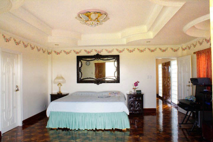 Master's bedroom showing king size bed