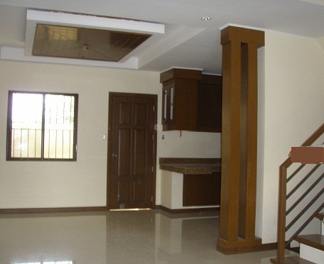 Spacious living areas with kitchen back door leading to the servant's quarter