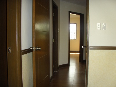 Hallway leading to 2 Bedrooms and a Comfort Room