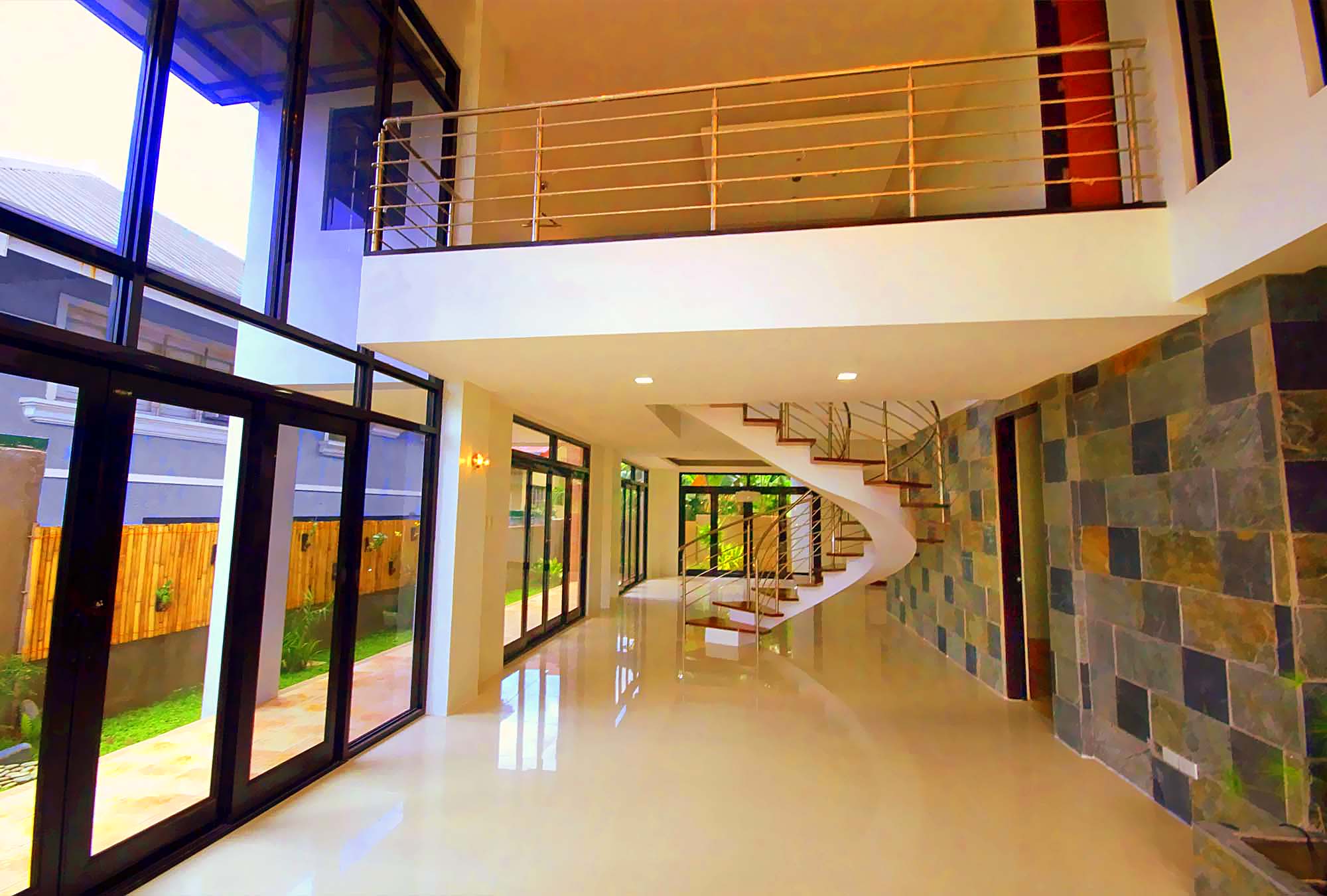 Living Room - High Ceiling; Dining Room (other end)