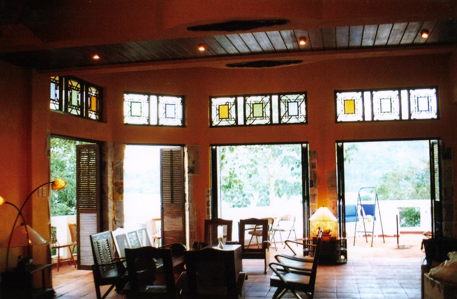 View of living room and terrace as seen from the front door