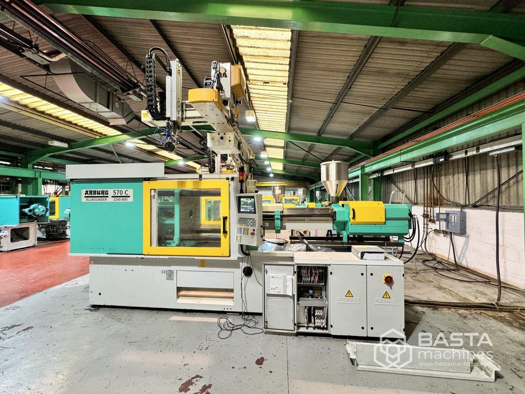 RESERVED: Arburg 570 C 2200-900 (only 24.000 working hours) + robot Apex