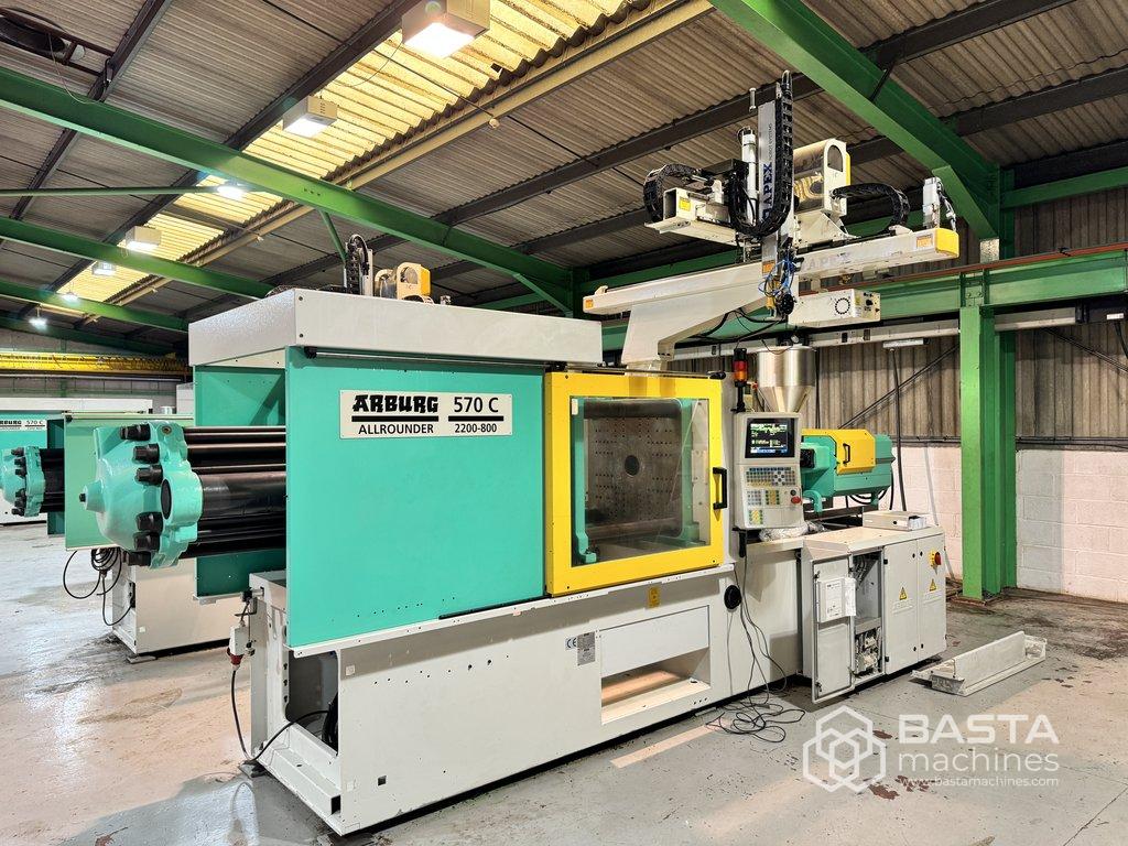 RESERVED: Arburg 570 C 2200-900 (only 24.000 working hours) + robot Apex