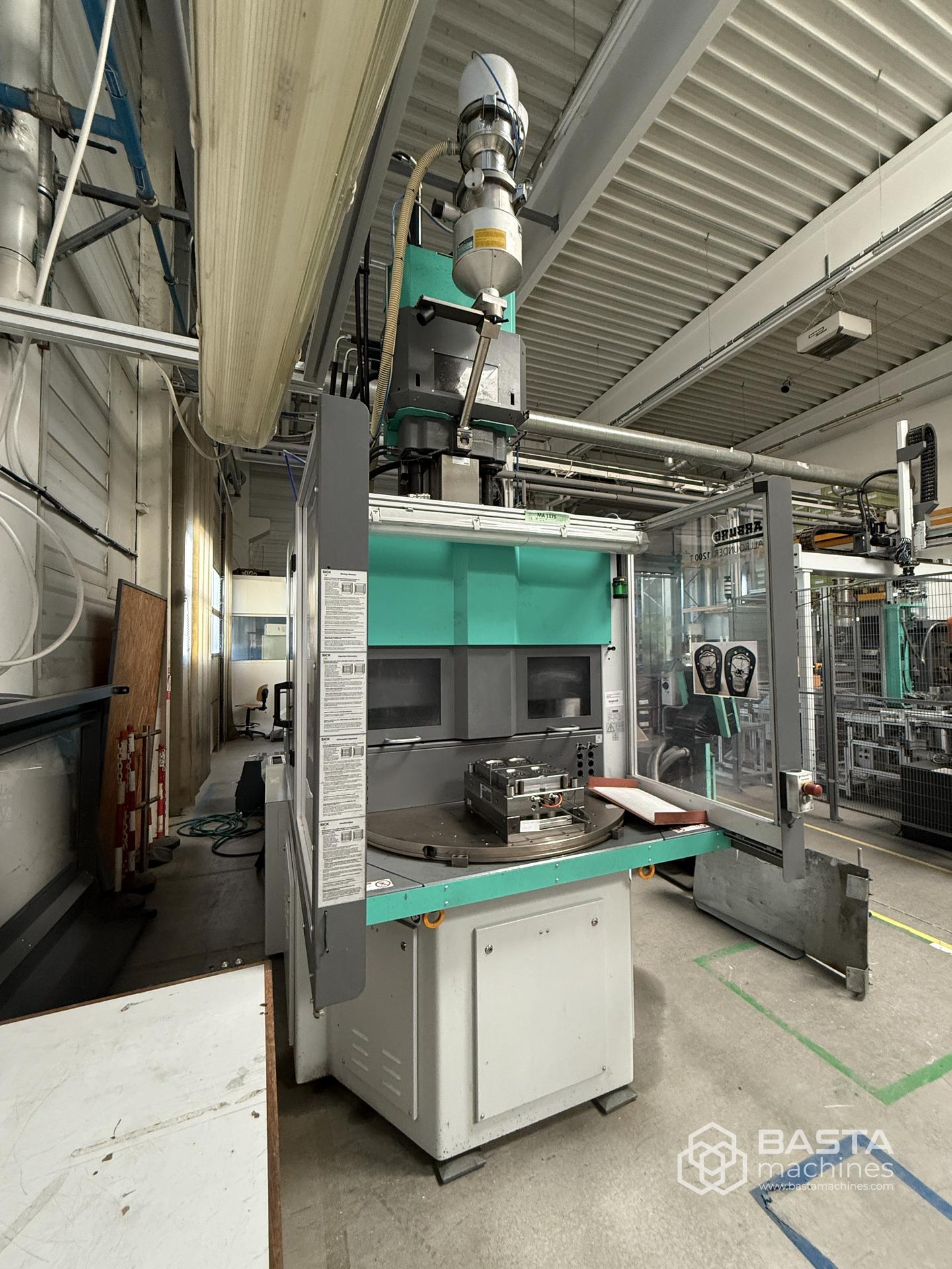  Arburg 1200T 2000-800 (vertical, rotary table,working hours: 9.562)