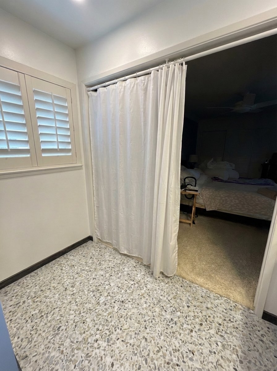 Chevron-pattern bathroom floor upgrade in warm neutral tones - AI tool