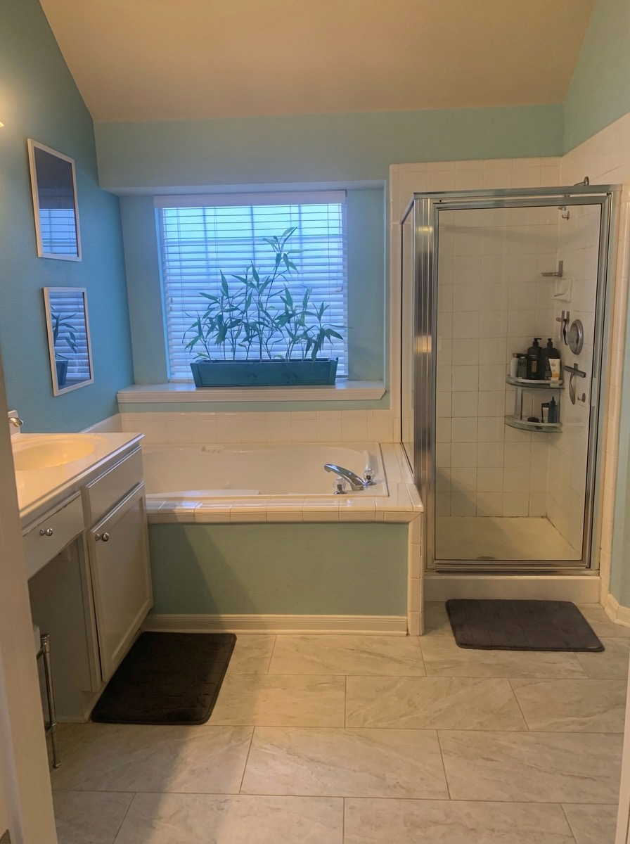 Pebble stone bathroom floor replacement for a natural shower feel - AI