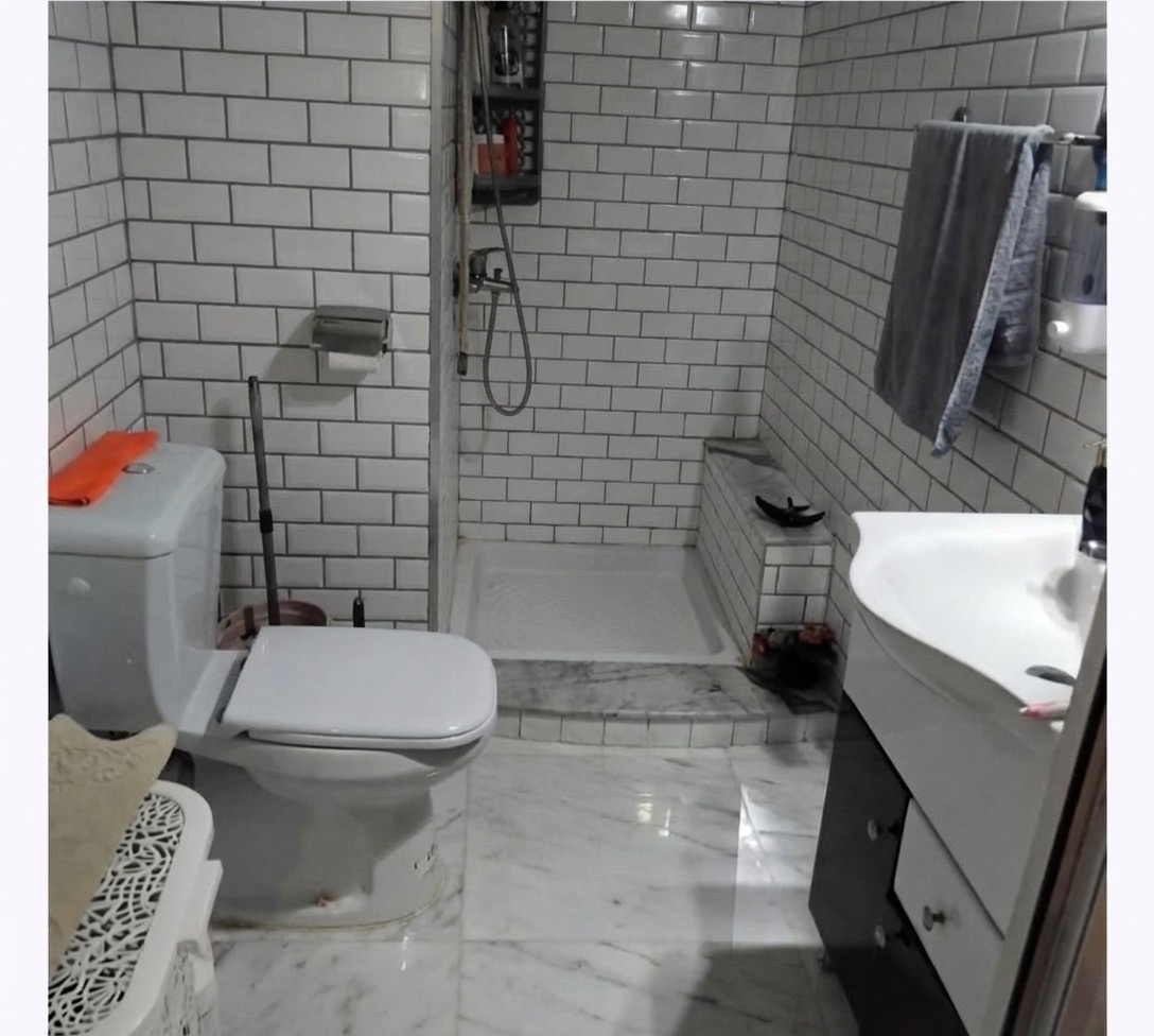 Shiplap accent wall bathroom renovation for a coastal look