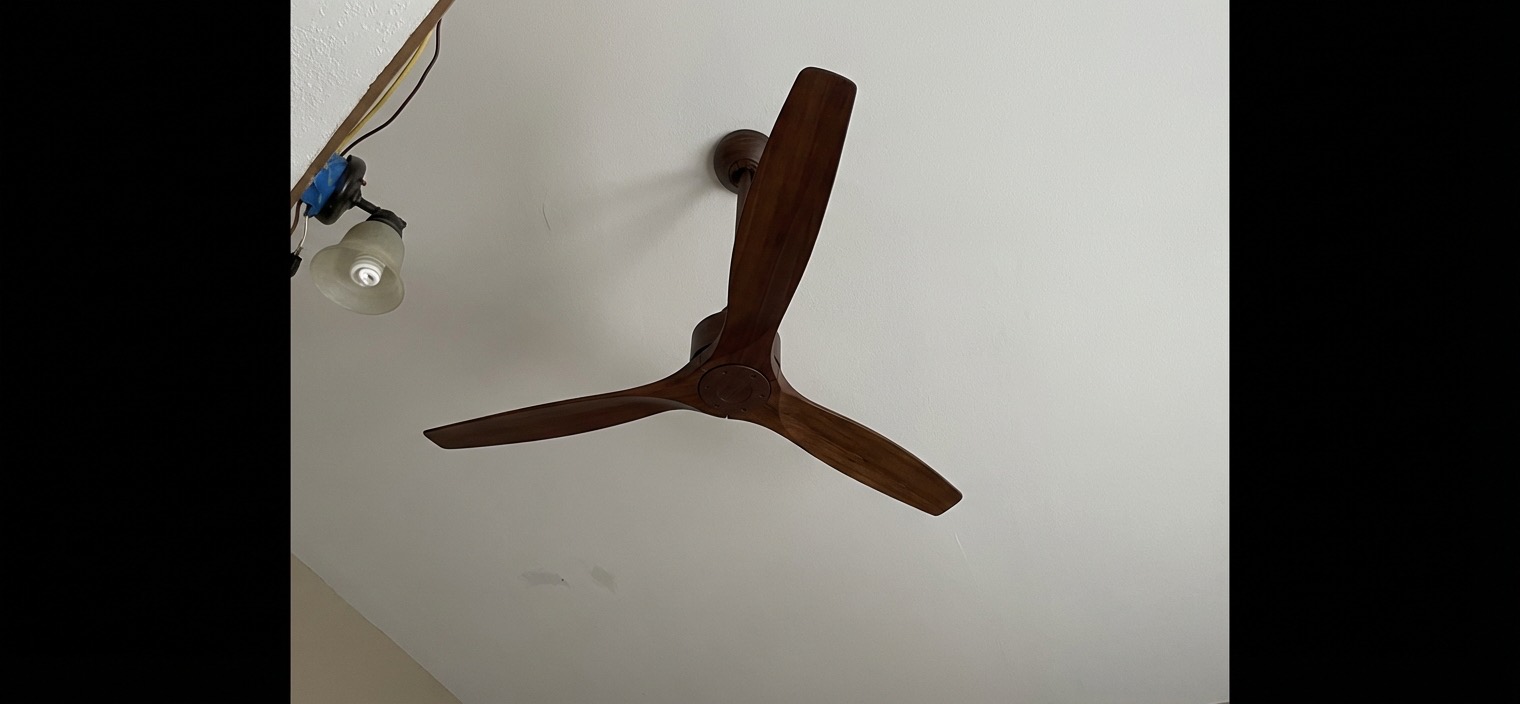 Updated bathroom fixtures with modern faucet and showerhead