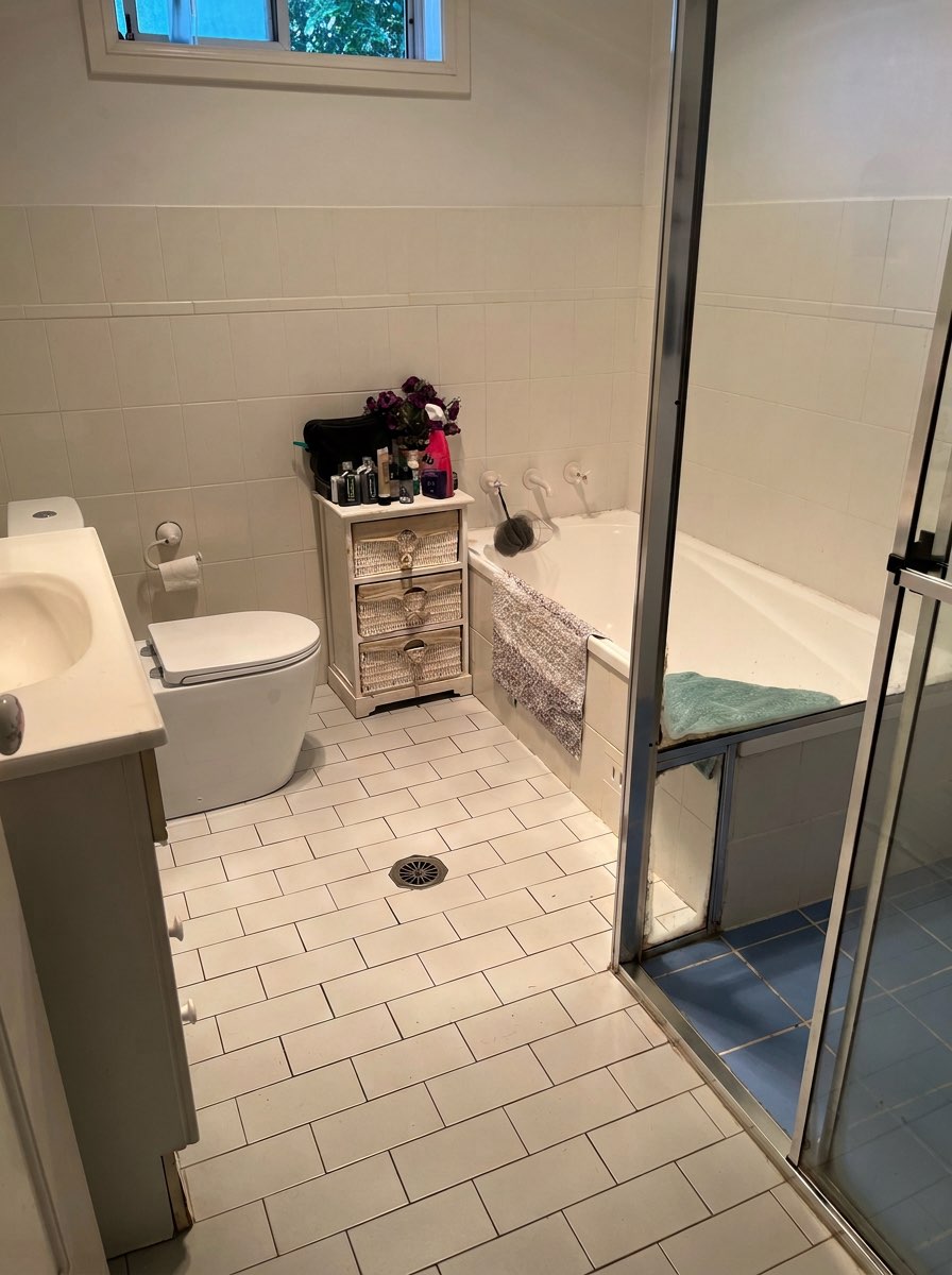 Bathroom lighting replacement with modern sconces and recessed lights