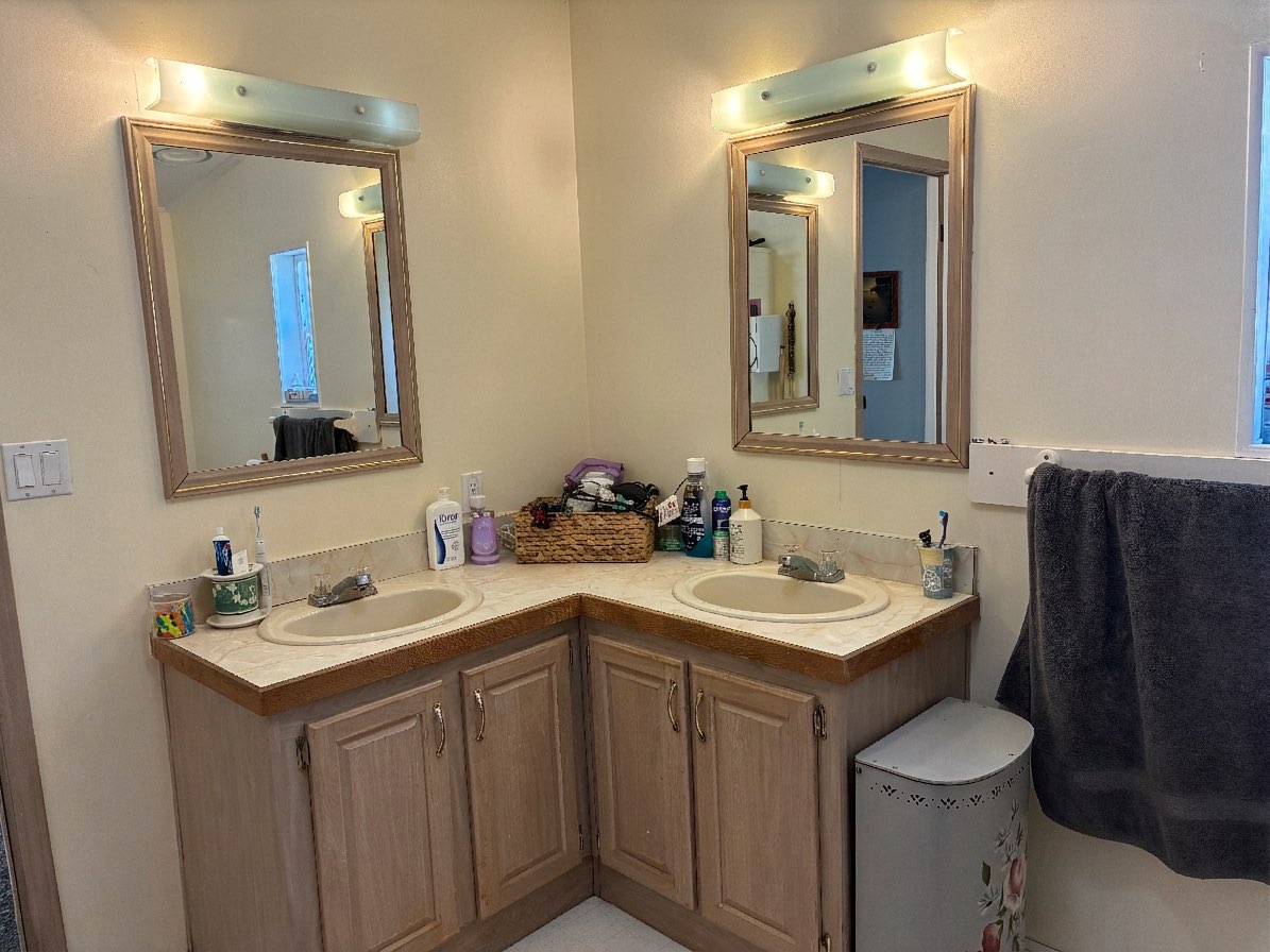 Bulky vanity removed and replaced with sleek floating design - AI