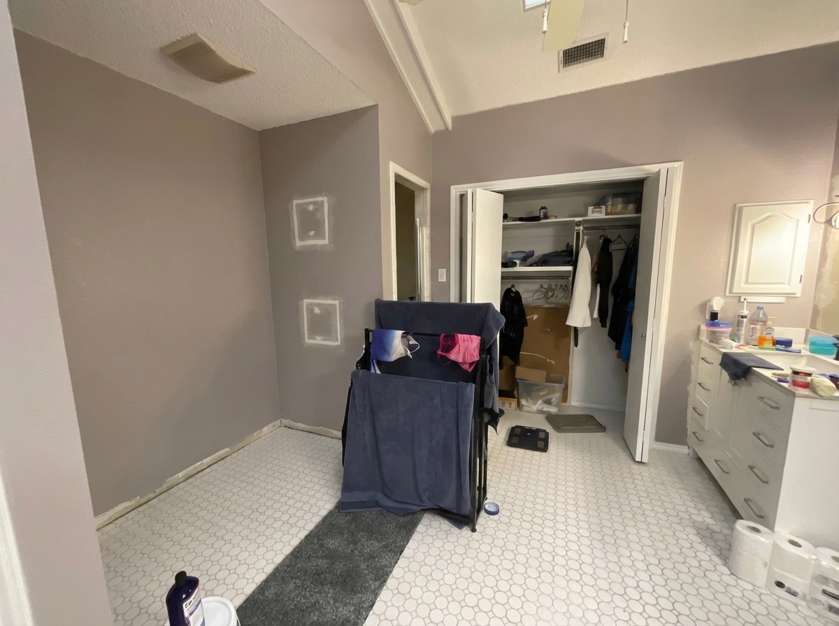 Bathroom mirror frame removed for a frameless contemporary look