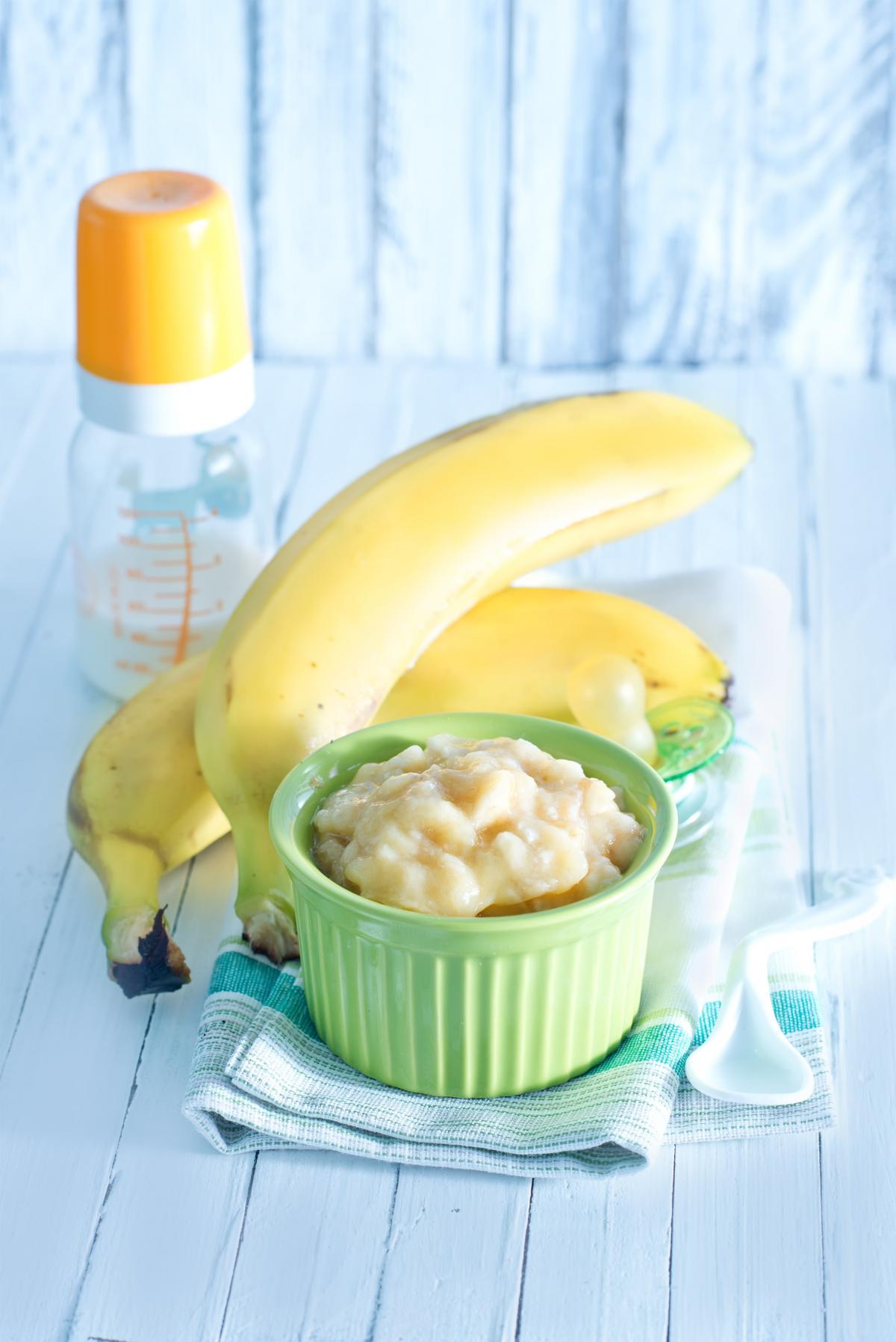 Preparing Baby Food, Homemade. Healthy Smashed Banana Mixed with