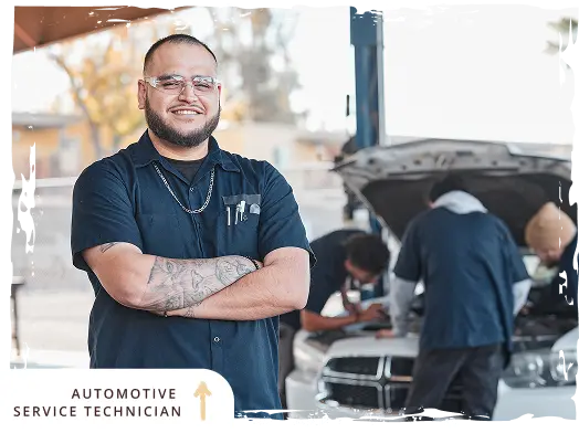 combination welding student welding with welders helmet on
