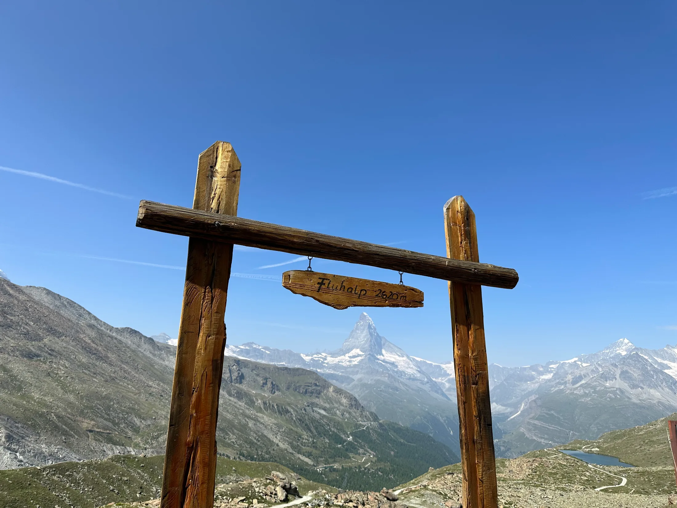 The Matterhorn framed by the signpost at Fluhalp, on the bonus day above Zermatt. The end of a very good week.