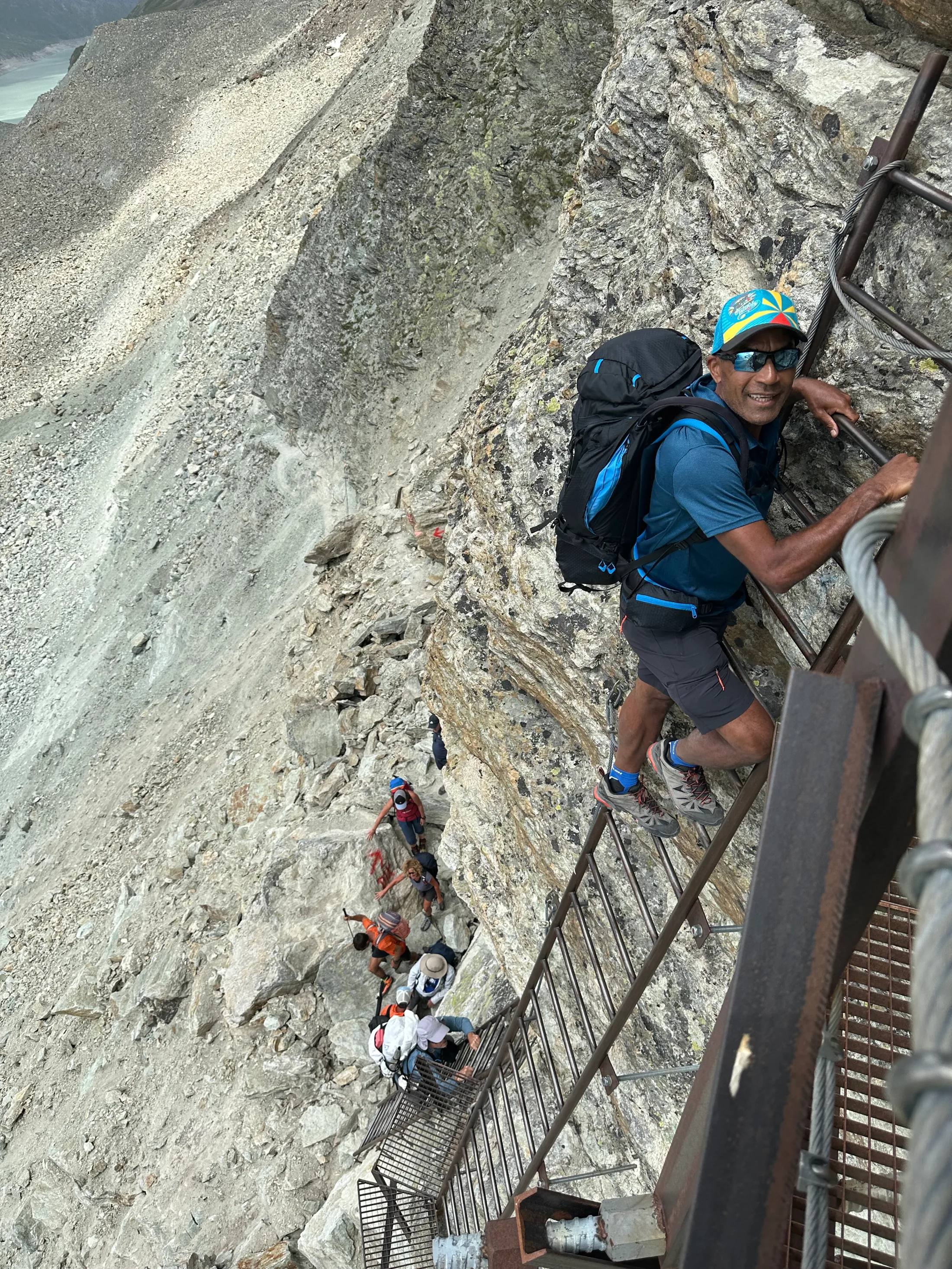The steel ladders dropping off the Pas de Chèvres, with the Glacier de Cheilon below.