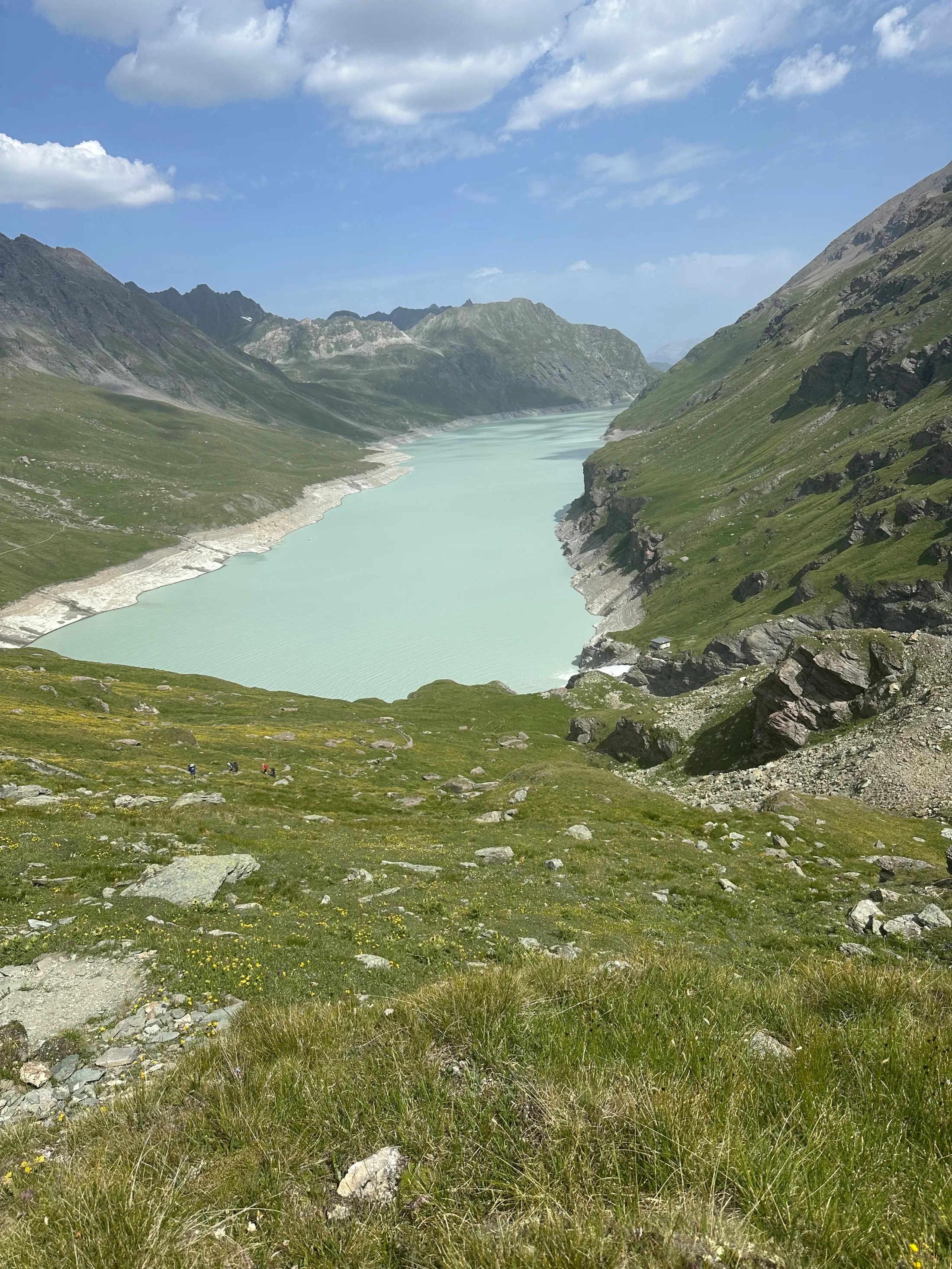 The milky turquoise length of Lac des Dix, a flat hour or two behind the Grande Dixence dam.