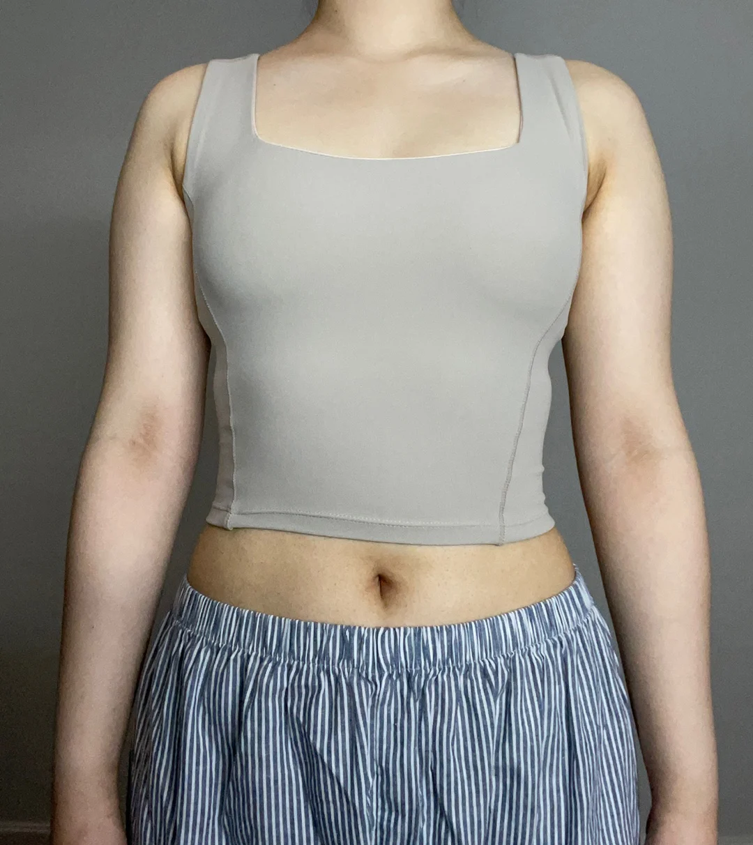 One month in! - Arm Liposuction Before 2 - TheLINE Plastic Surgery