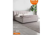gestoffeerd bed met gecapitonneerd hoofdbord