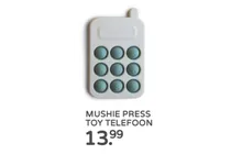 mushie press toy telefoon
