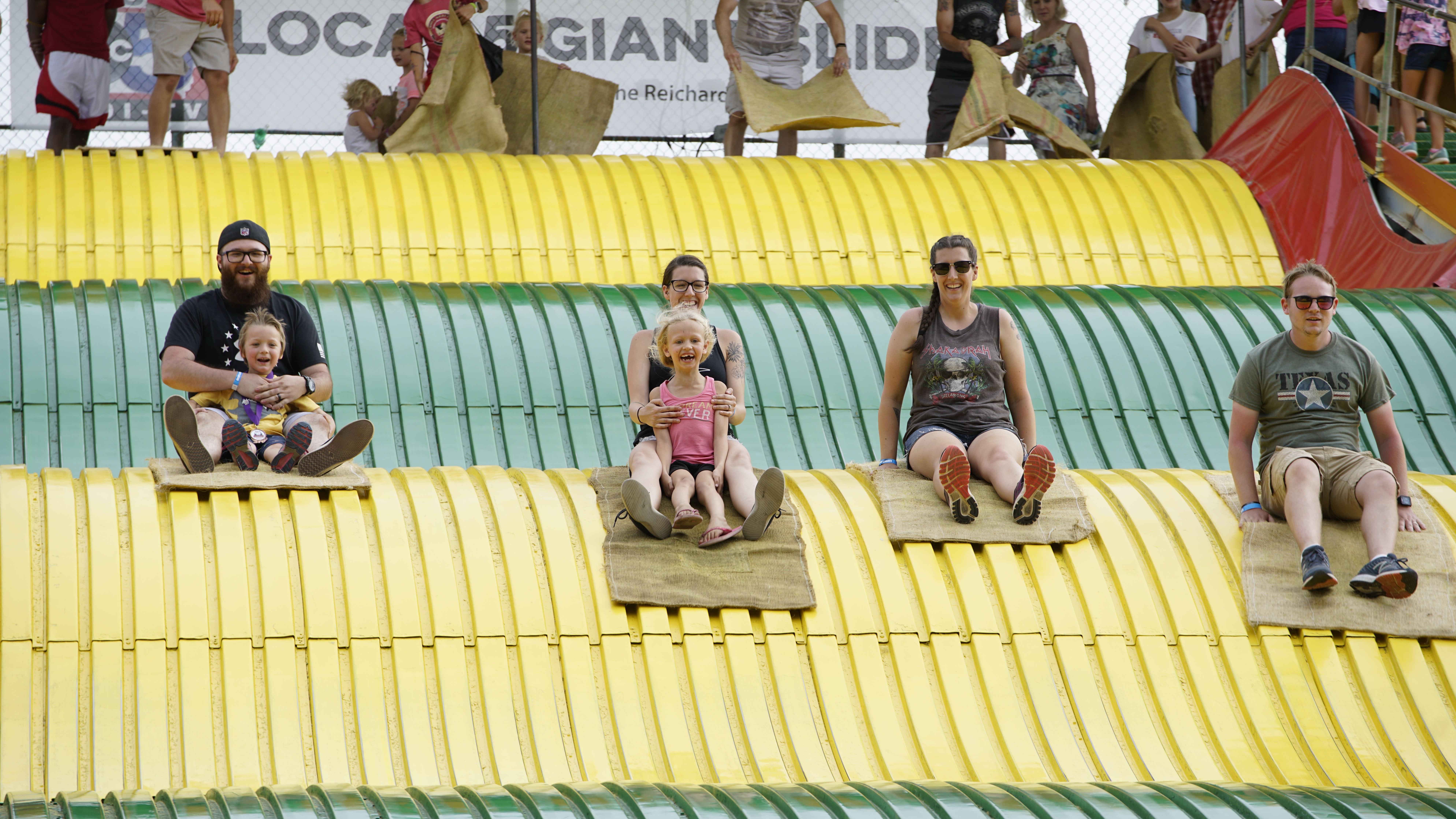 Fairgoers on the Giant Slide