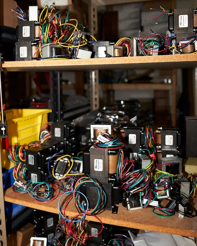 Shelves of Mercury Magnetics transformers in the Milkman Sound shop