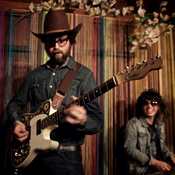 Tim Marcus performing live on guitar