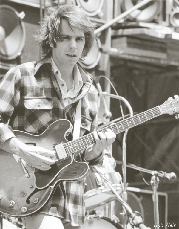 Bob Weir playing on stage
