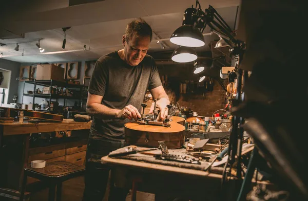 Tom Crandall at work in his shop