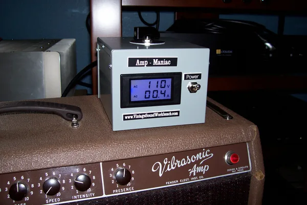 Amp Maniac voltage regulator atop a Fender Vibrosonic amp