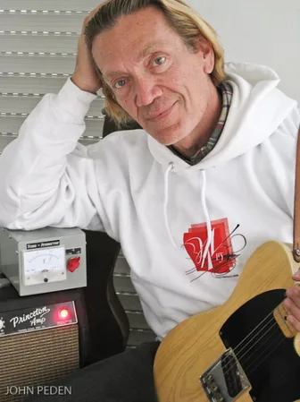John Peden with a Telecaster and Princeton amp, Tone Preserver unit visible