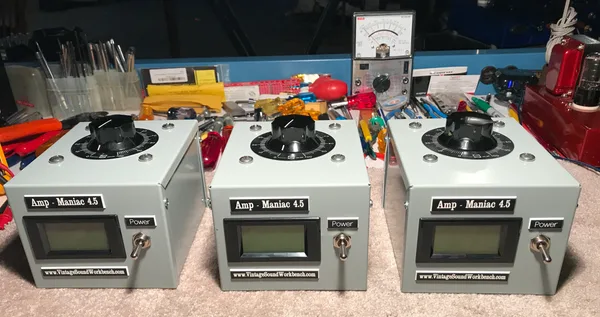 Three Amp Maniac 4.5 voltage regulation units on the workbench