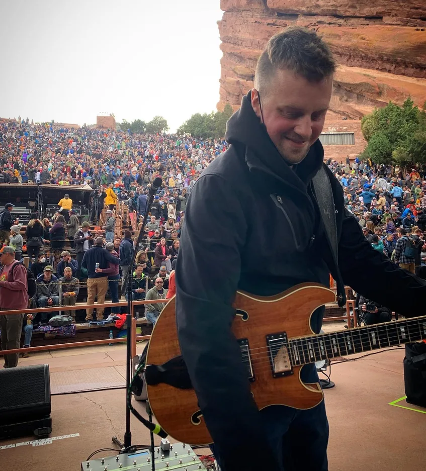 Justin Stabler at Red Rocks with a Languedoc guitar