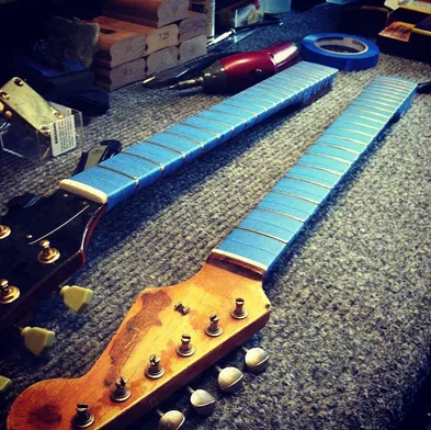 Guitar neck on the workbench at Joe Glaser's shop