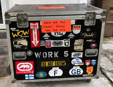 Justin's road case covered in stickers