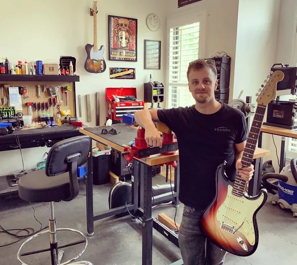 Home Work Studio — Justin in his home guitar workshop