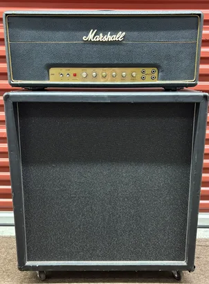 Marshall Plexi 100W atop Badcat cabinet.