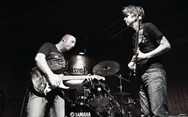 Oz and Eric Johnson.