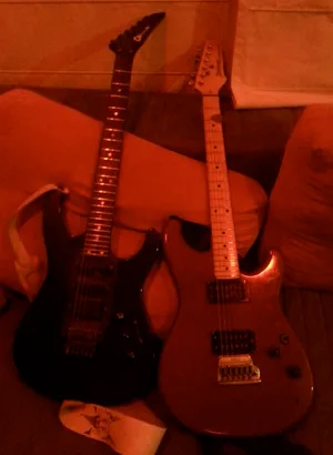 My first two electric guitars: Charvel and Ibanez.