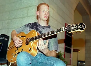 Oz with Epiphone L5.