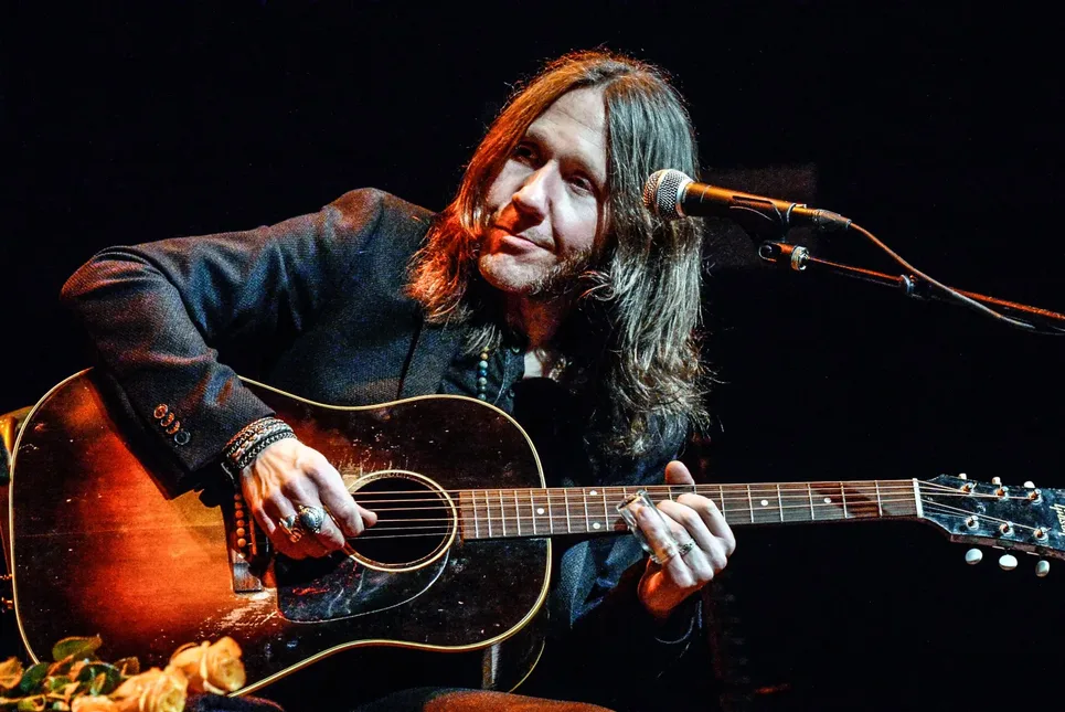 Charlie Starr performing with acoustic guitar