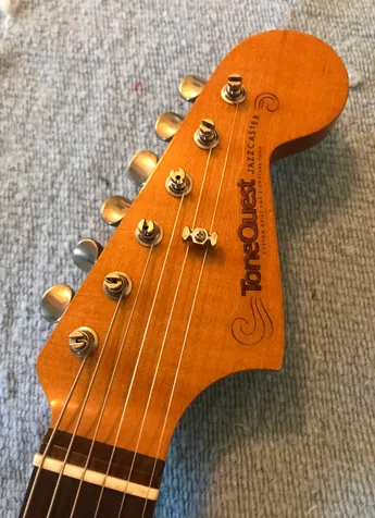 Completed ToneQuest Jazzmaster headstock with waterslide decal