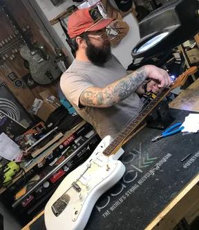 Clancey Compton working on the TQ Jazzmaster at Rockin' Robin