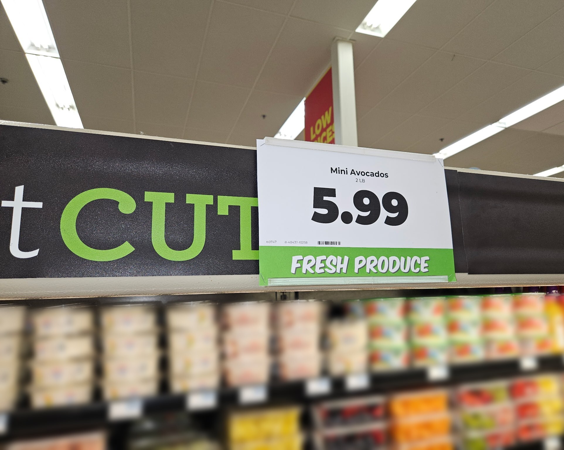 Single Label Canopy Bracket holding a produce price sign