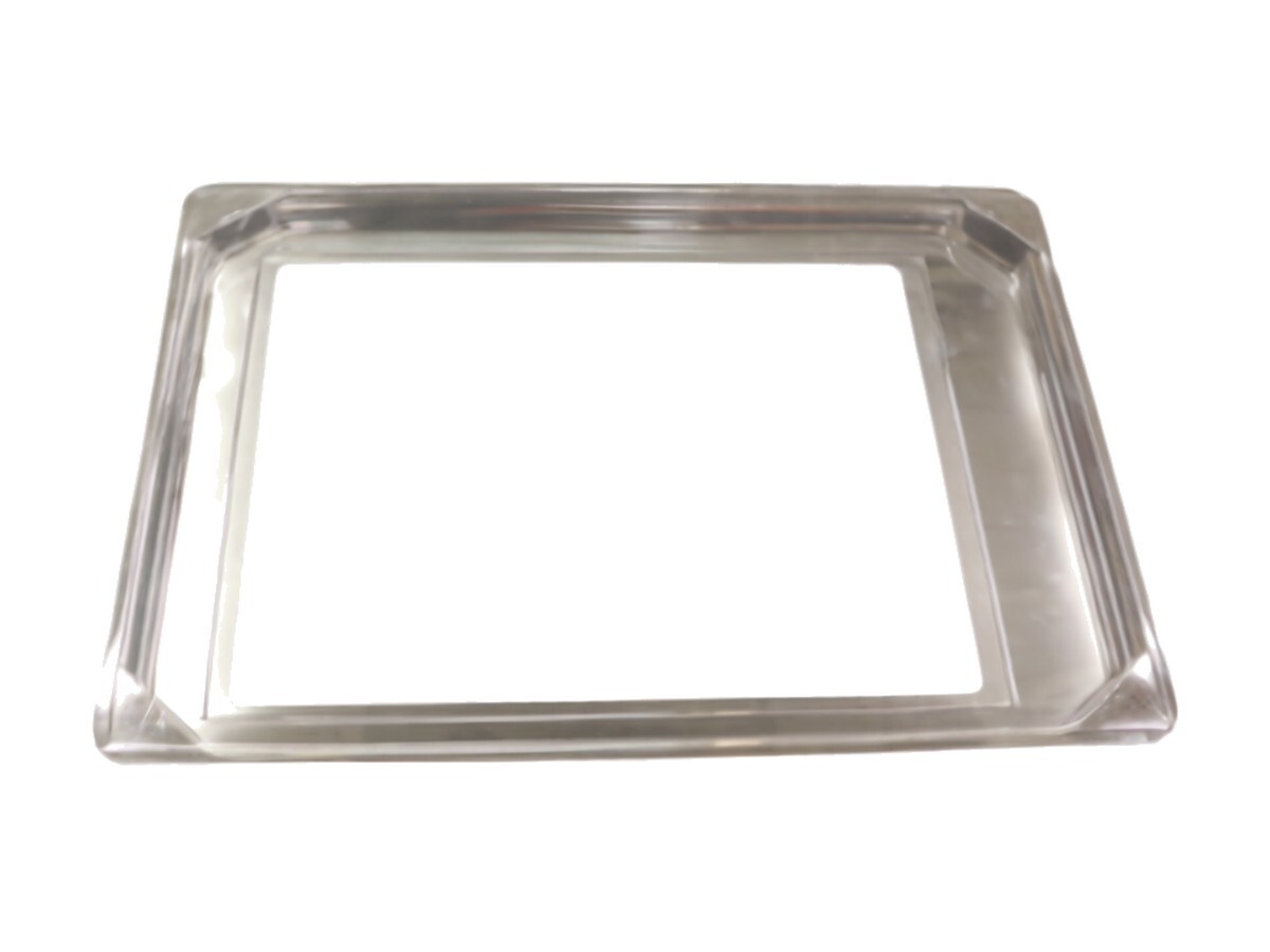 Clear tray insert with a window cut-out used in a silk screening operation