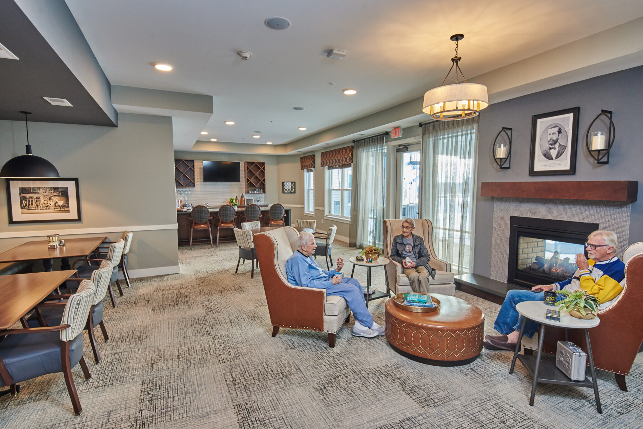 residents relaxing and chatting in the common room