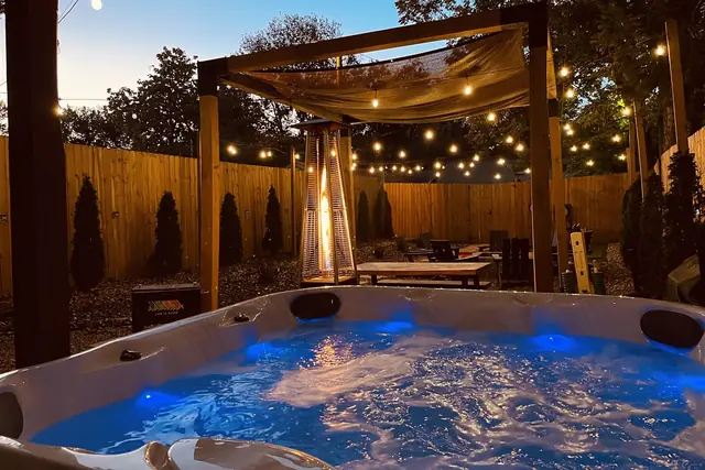 Bonnycastle Blue: Hot tub under the pergola