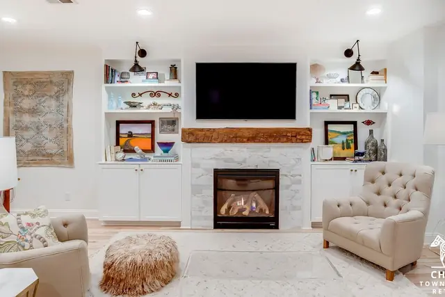 Cheers Town Centre Retreat Norton Commons Luxury Condo: Fireplace with built-in shelving